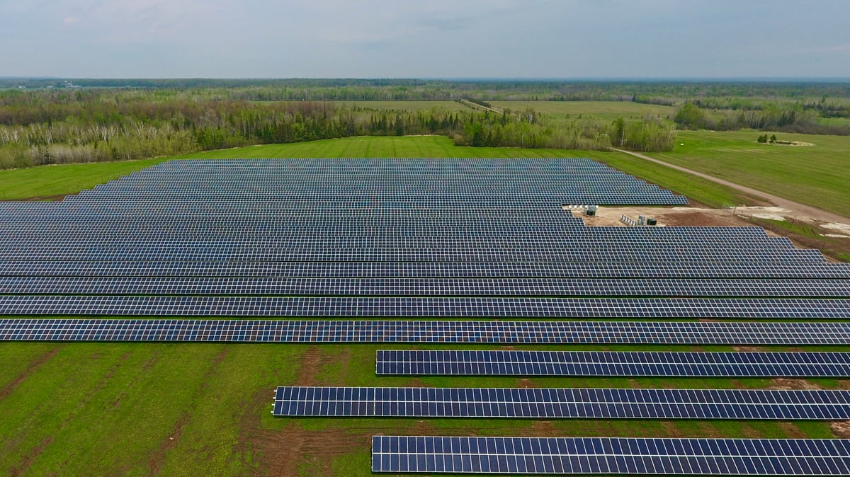 A solar farm with uneven rows.